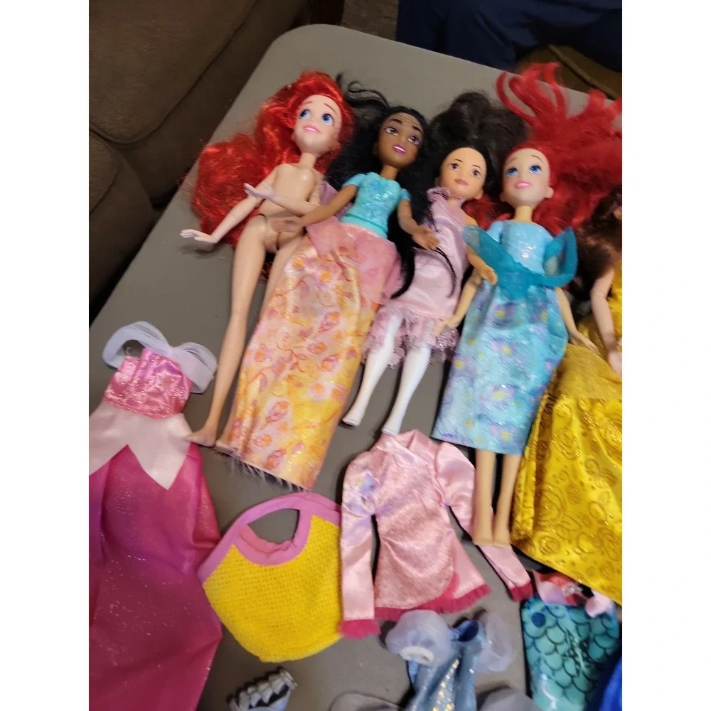 Disney Barbie dolls with extra dresses shoes etc... Mixed lot